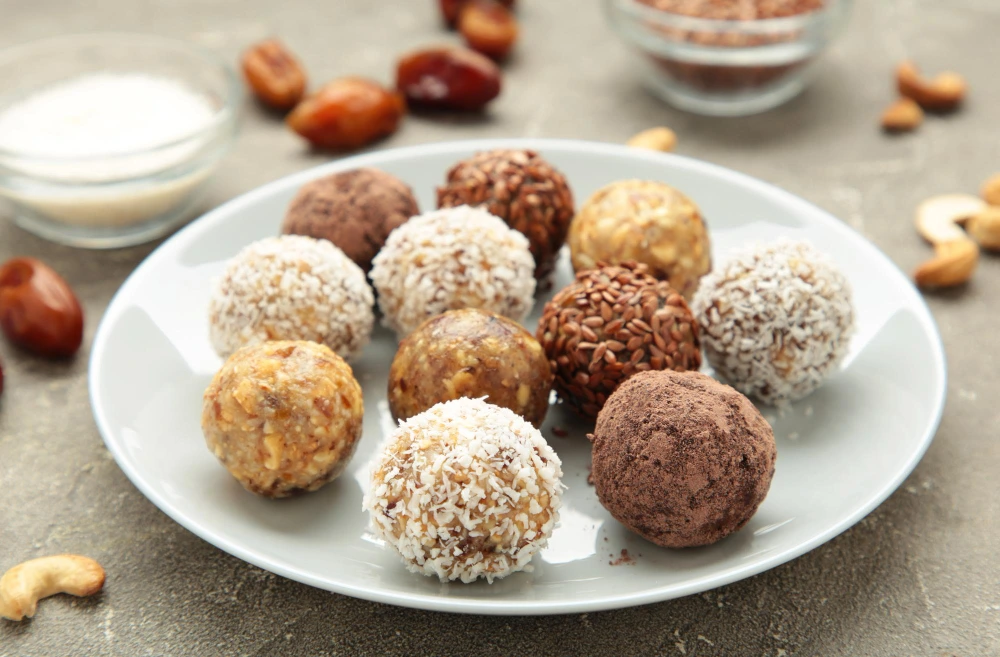 Delicious coconut energy balls arranged on a plate