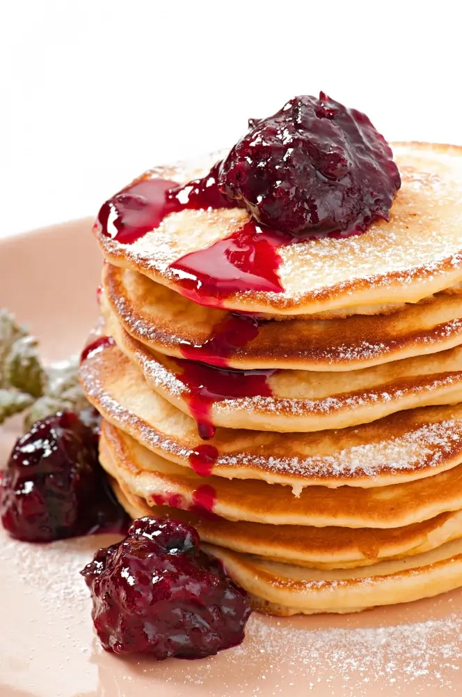 French Toast Pancakes Recipe: Fluffy, Delicious, and Easy to Make 3 Delicious pancakes with strawberry jam