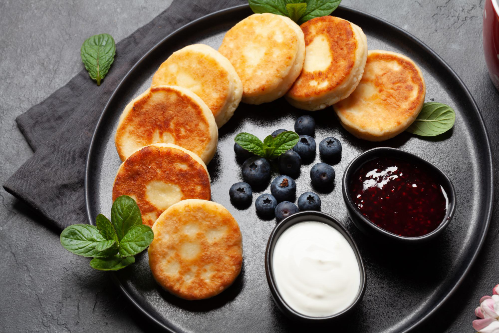 Mini protein pancakes served on a plate