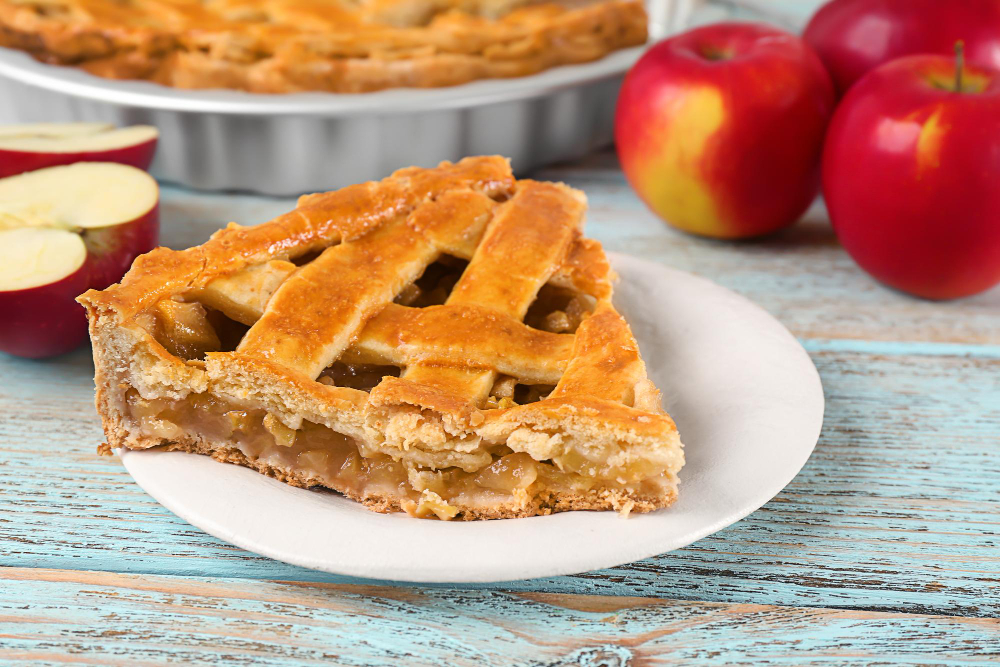 Homemade apple pie made with canned filling, showcasing a golden crust and perfectly baked apples.