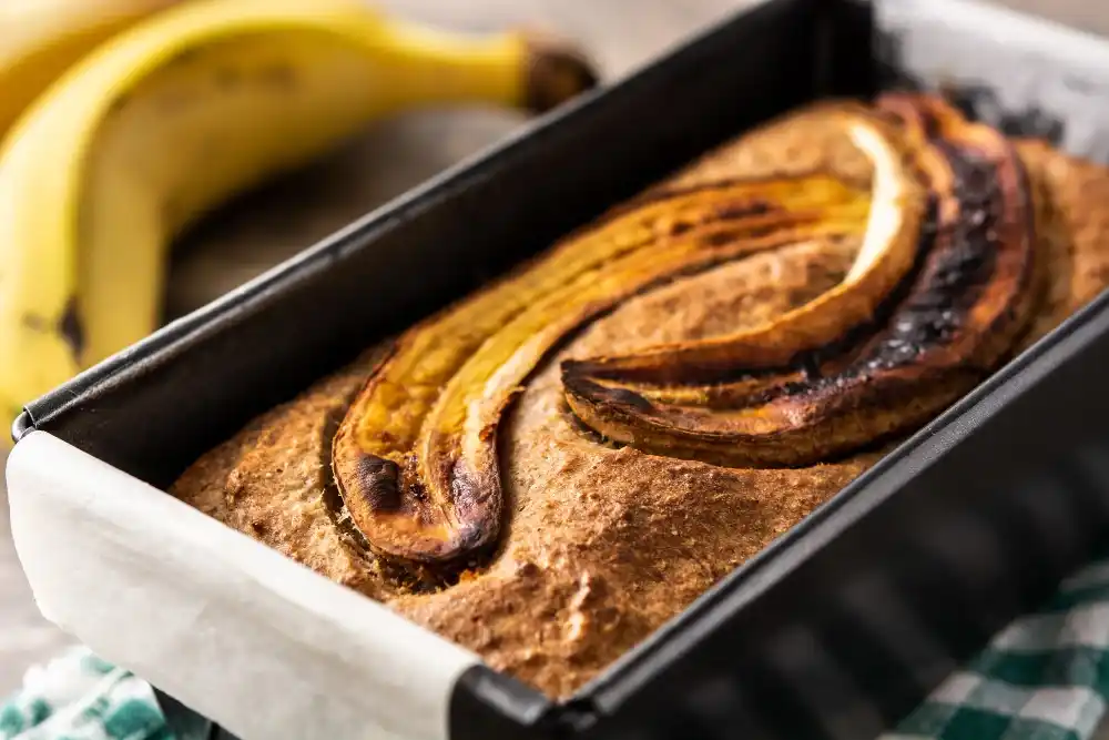 Banana Bread Cinnamon Rolls: A Step-by-Step Guide 3 Homemade banana bread on wooden table