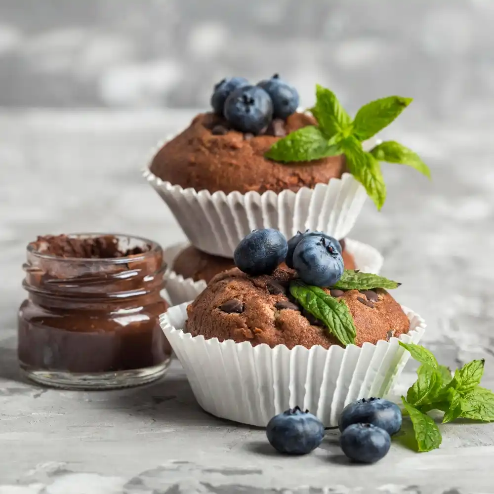 Protein Pancake Muffins: Healthy Recipe for a Balanced Diet 2 Delicious muffins with chocolate and fruit