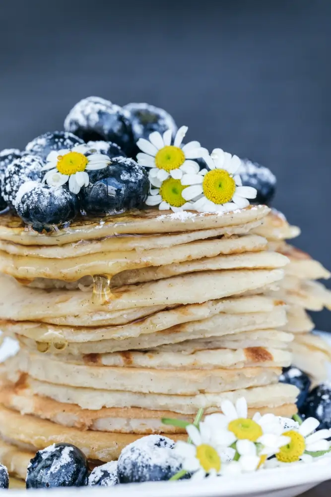 Protein Pancakes Without Protein Powder: Delicious and Nutritious Alternatives 2 protein pancakes without protein powder with blueberry toppings