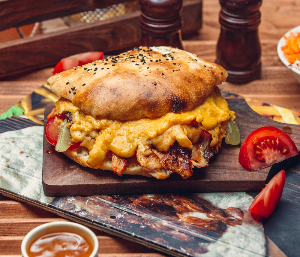 Finished cheesy chicken sloppy joe served on a plate.