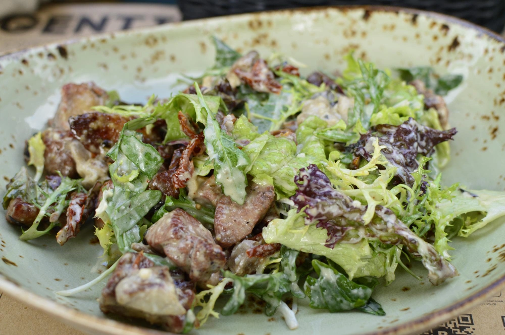 The Ultimate Steak Caesar Salad Recipe for a Delicious Meal 4 Close-up of creamy Caesar dressing